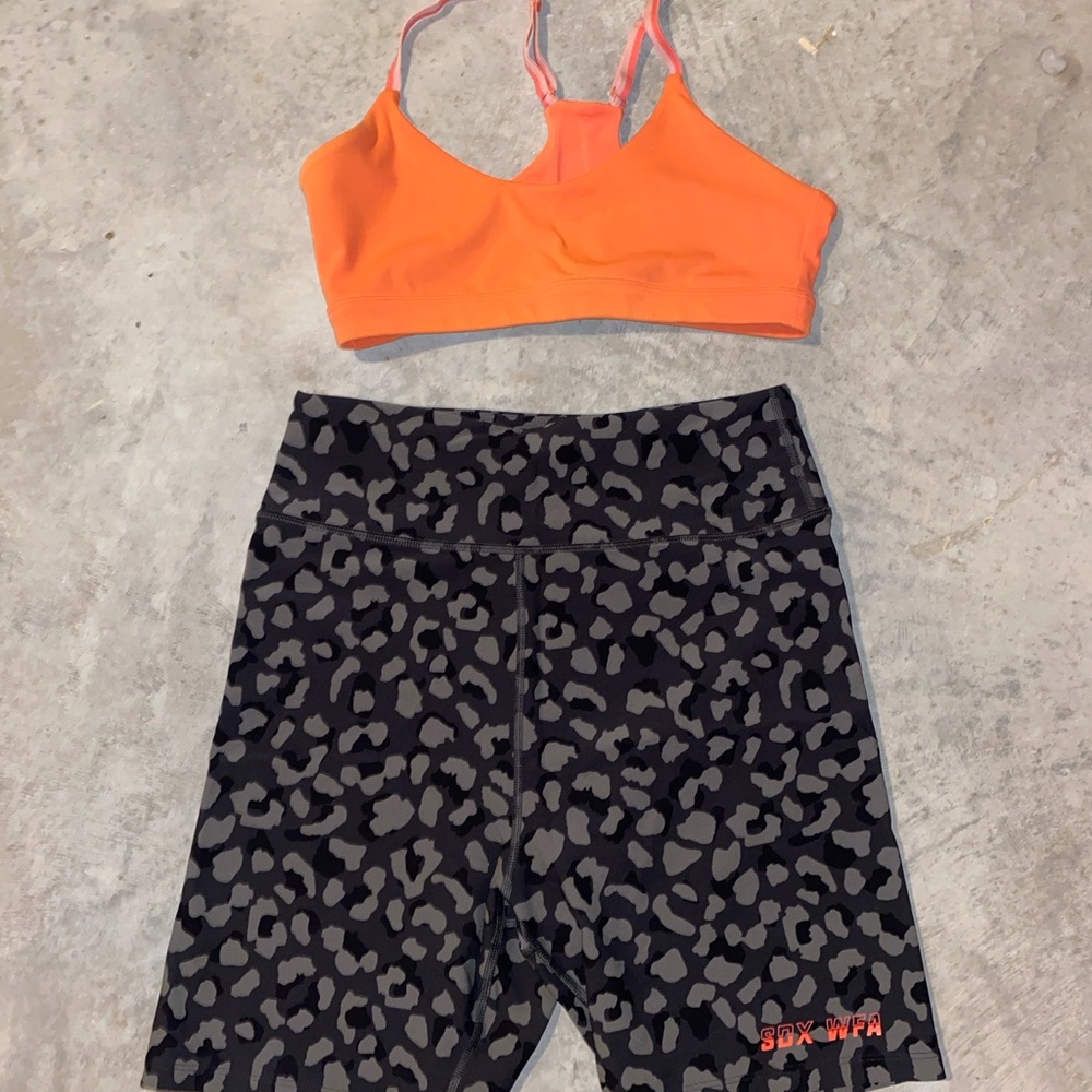 White Fox Boutique Orange Sports Bra and Black Leopard Leggings